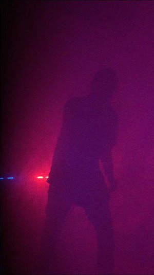 Street Sect's vocalist Leo Ashline immersed in fog.